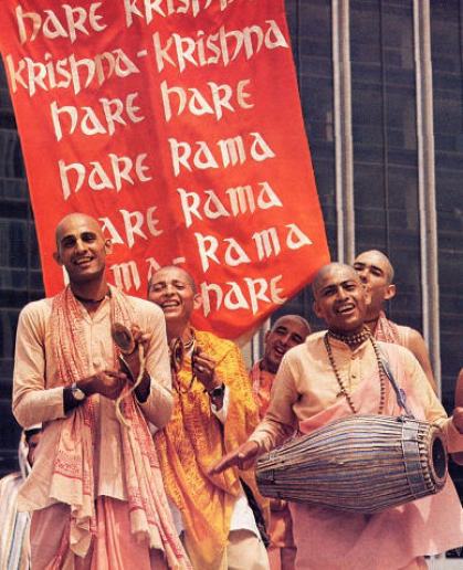The Hare Krishna maha-mantra burns up all material desires and delivers transcendental love for Krishna. It makes one blissful just like the devotees in this picture. So start chanting now ...